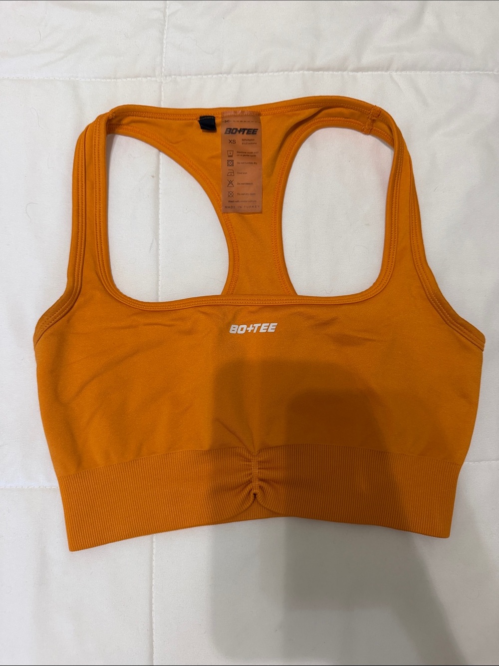 BO+TEE Orange Seamless Racerback Sports Bra